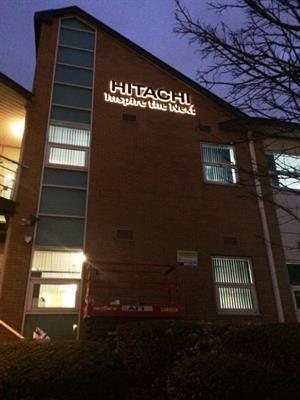 Hitachi building with illuminating sign